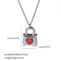 Silver electroplated gothic Halloween necklace with bat and spider pendant designs on a chain.