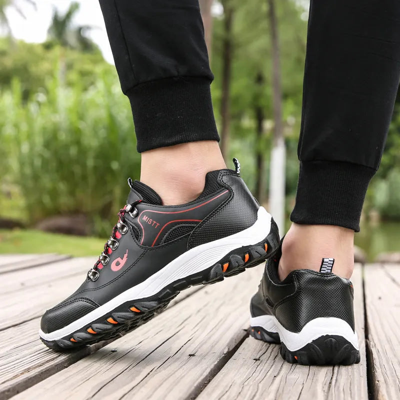 Men's outdoor hiking shoes in black with non-slip rubber outsole and lace-up closure