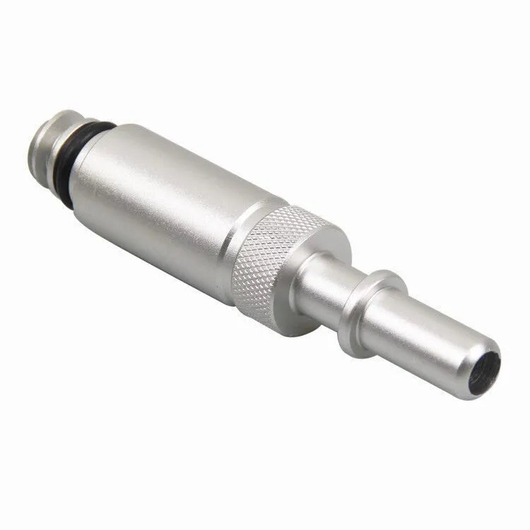 Silver metal transmission refuelling joint tool for VAS6262-9 on a workshop bench.