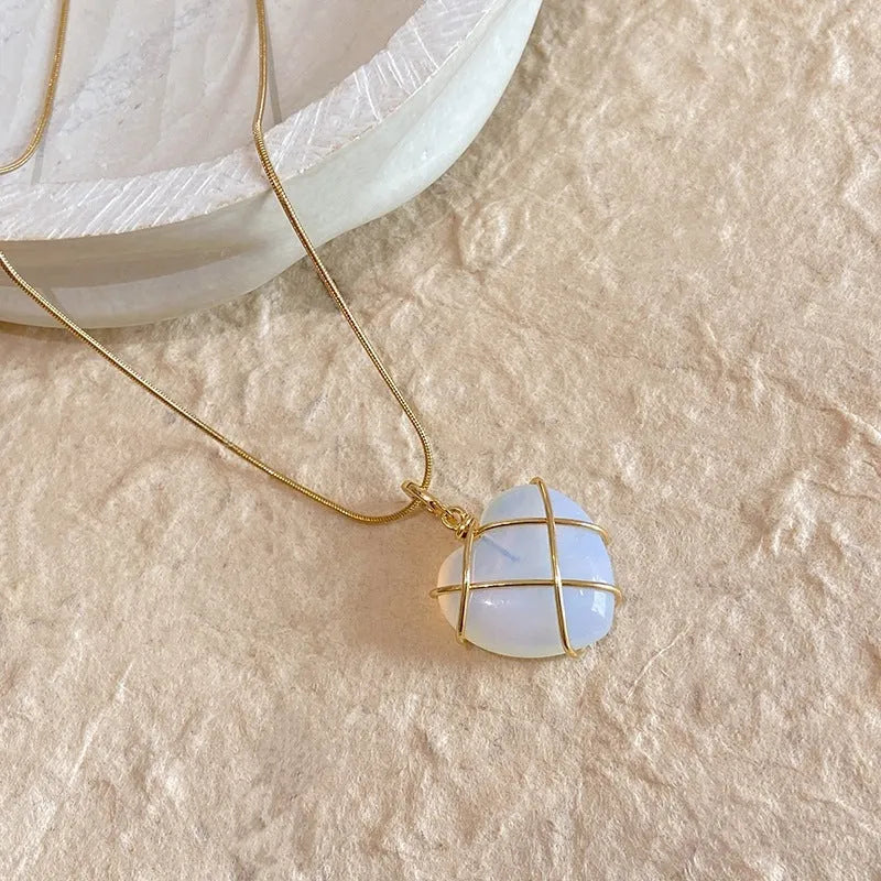 Heart-shaped moonstone pendant necklace on copper chain with electroplated real gold finish