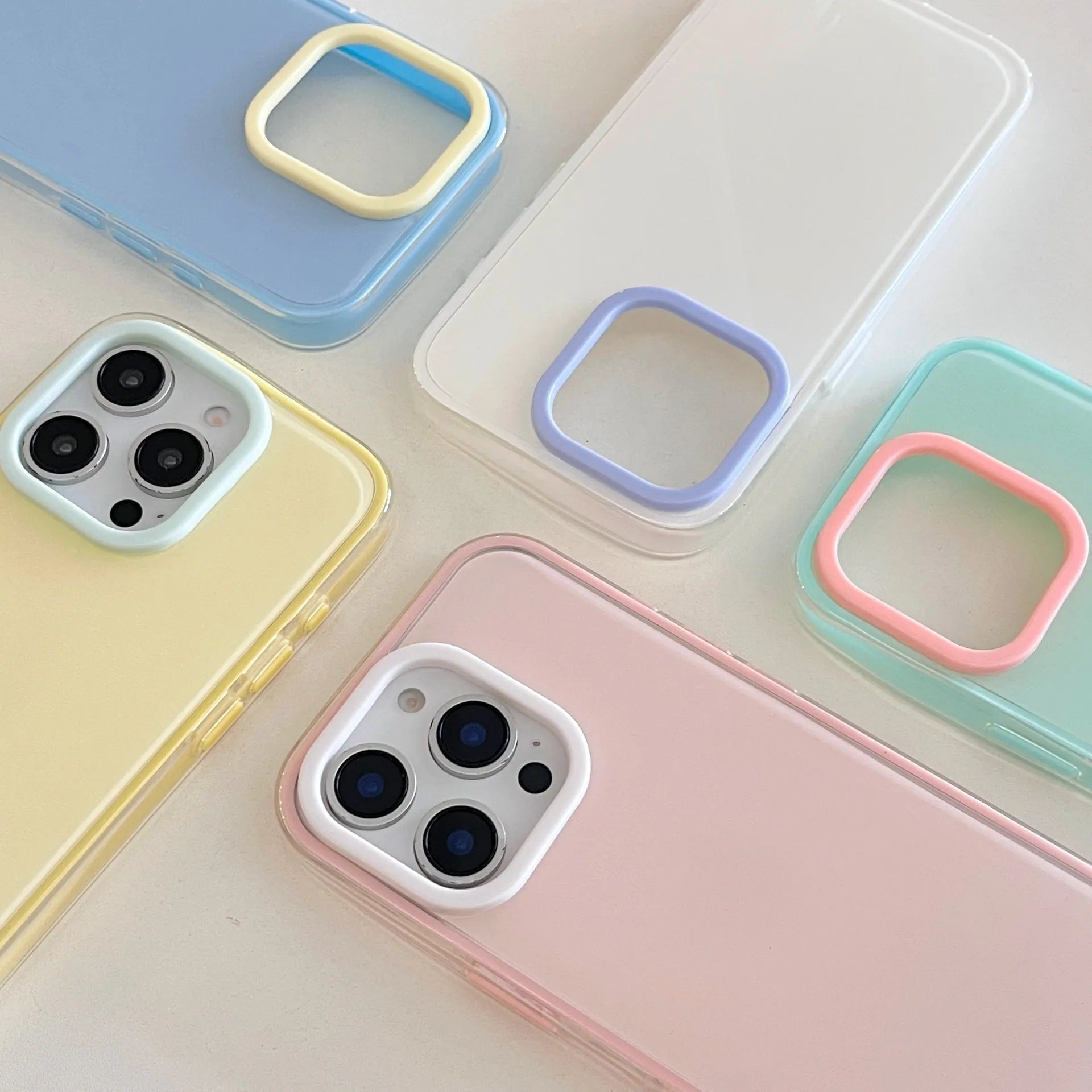 Clear jelly all-inclusive iPhone case in blue, white, yellow, pink and green colours for drop protection