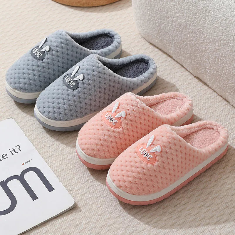 Women's plush rabbit plaid design house slippers with artificial fur and a light brown anti-slip rubber sole.