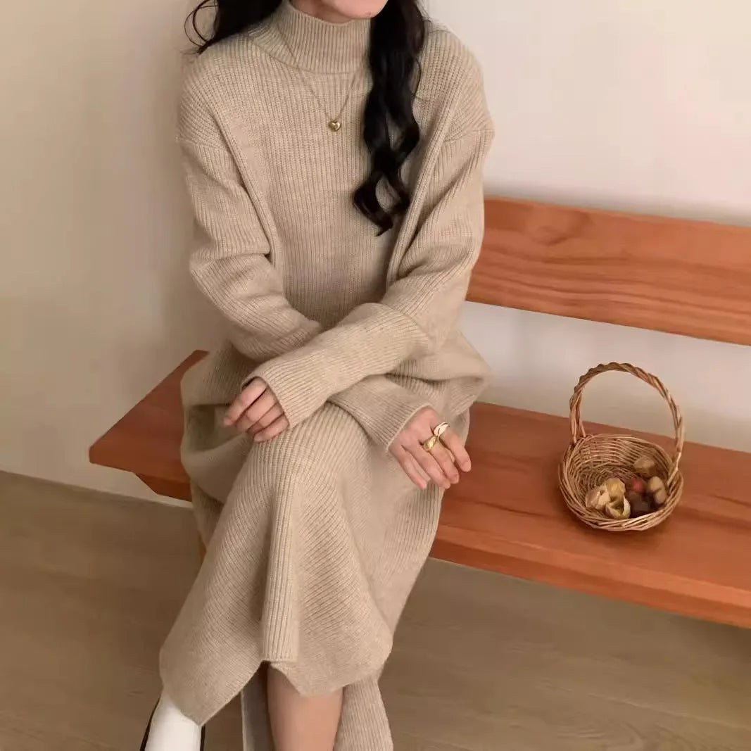 Women's acrylic knitted dress with half turtleneck, long sleeves, and midi length in solid colour