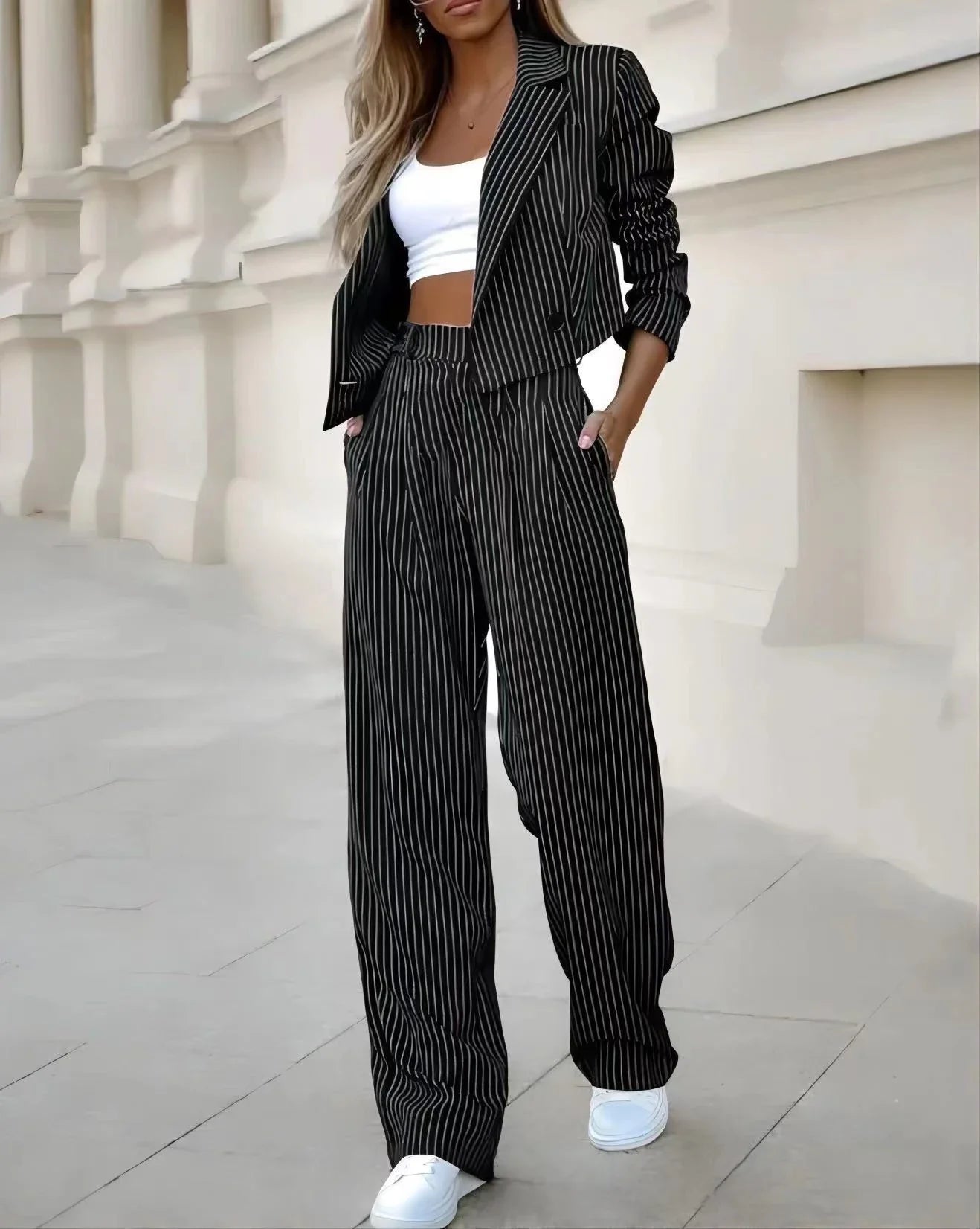 Stylish striped suit set with cropped top and straight-leg pants in various colors