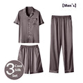 Men's black ice silk three-piece home wear suit showing pyjamas, shorts, and trousers on a hanger.