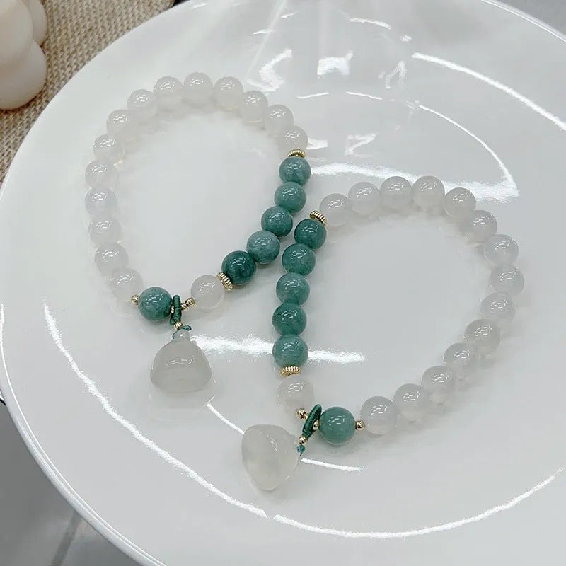 Women's retro Chinese style agate bracelet with carved lotus seedpod design