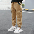 Boys' casual cotton trousers in army green, shown laid flat with size label visible.