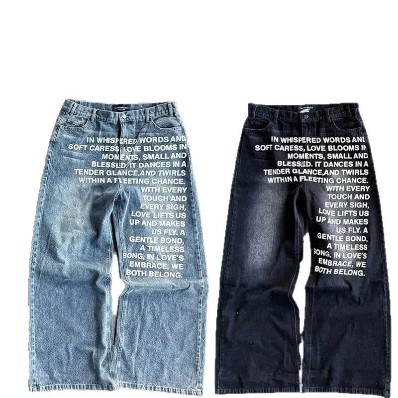 Men's loose-fit wide-leg straight trousers in black cotton fabric, laid flat to show the casual cut.