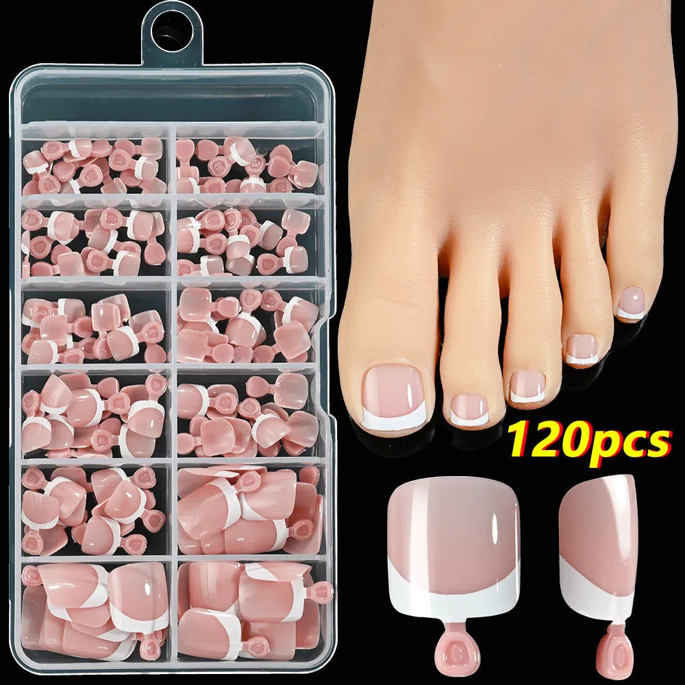 120 piece box of French white edge full square short nude artificial nail tips in nine shades.