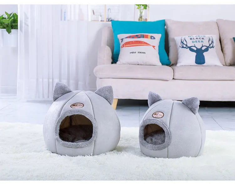 Semi-enclosed warm and fluffy pet nest in plush fabric with raised rim, available in M L and XL sizes for dogs and cats
