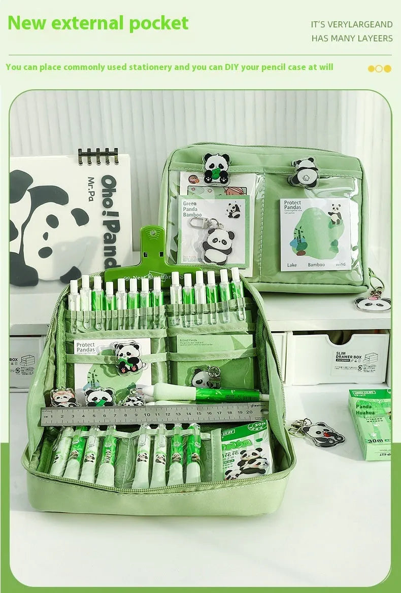 Green canvas pencil case with panda design showing 12-layer compartments open