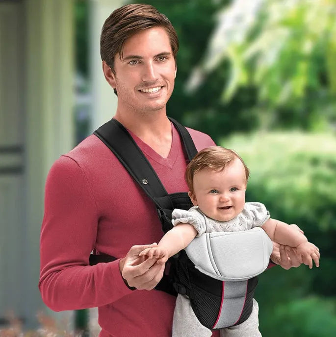 Double-shoulder baby carrier in red colour showing front-facing infant carrying position