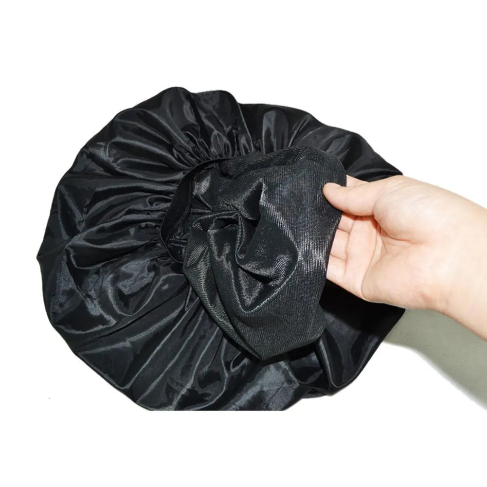 Black beauty salon cap with elastic fit, 45cm diameter, warp lining and Chunya spinning outer layer