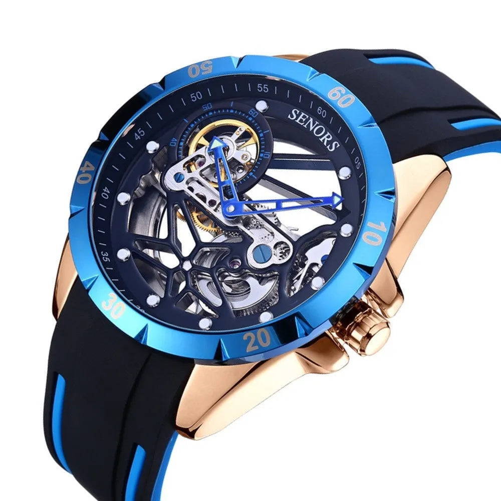 Automatic men's skeleton watch with rose gold case and blue dial showing mechanical movement