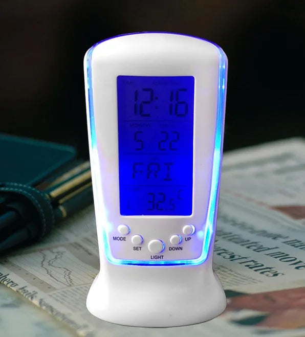 Multi-function LED digital clock with rectangular plastic body, blue backlight, and LCD showing time and temperature