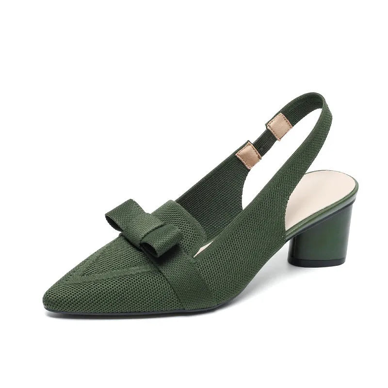 Women's black high heel sandals with closed pointed toe, decorative bow, and ankle buckle strap.
