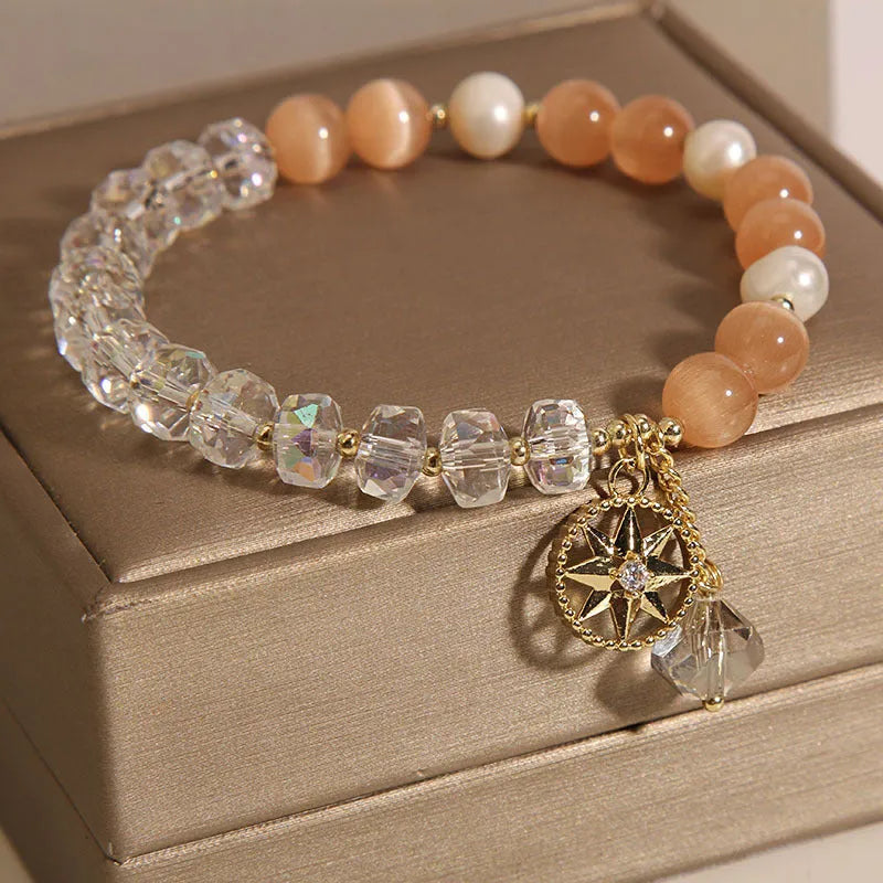 Orange eight-point star opal crystal bracelet with gold-plated settings
