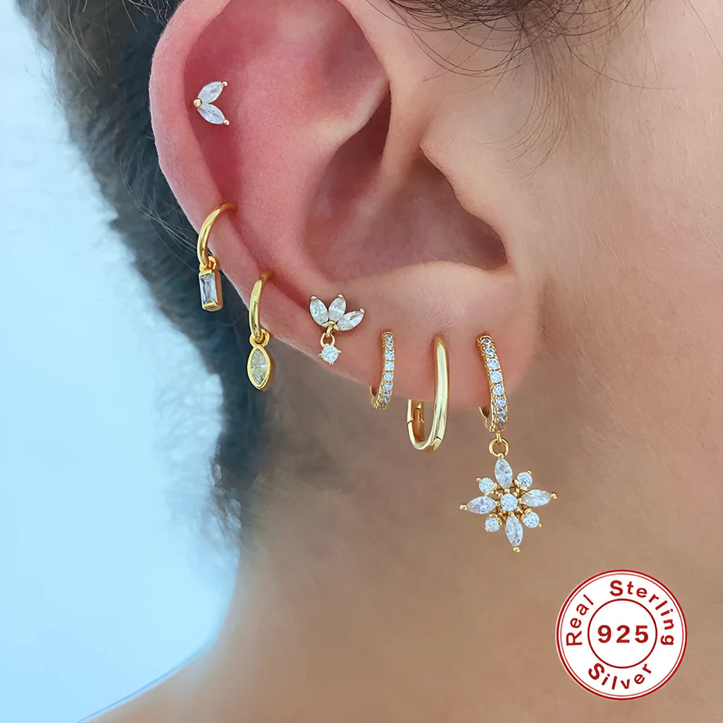 Sterling silver snowflake pendant earrings with geometric design and gemstone accents