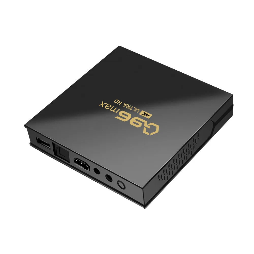 Q96 MAX Android TV box set-top box with remote control, HDMI cable, and power supply