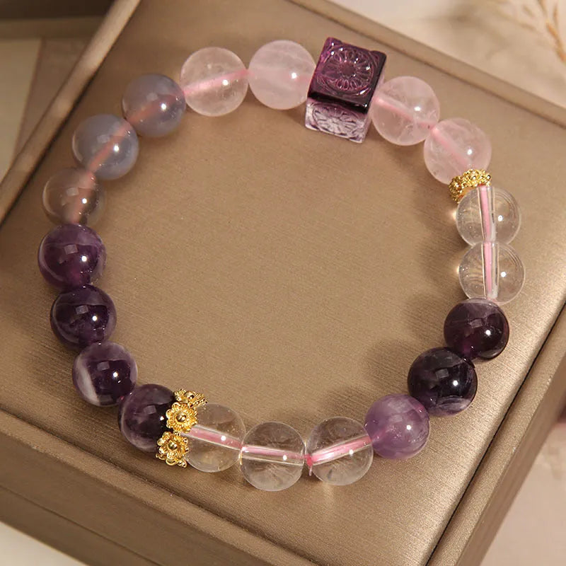 Purple women's amethyst crystal bracelet with rhinestone details showing 10mm size