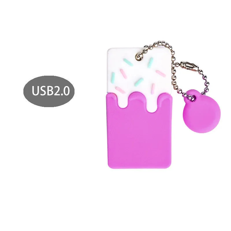 Cartoon cake pendant USB flash drive with PVC case, anti-loss attachment and 32GB capacity.