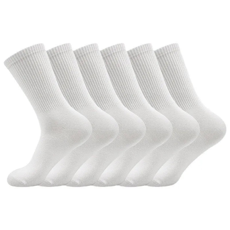 A pair of black mid-calf sports socks made from polyester cotton fabric.