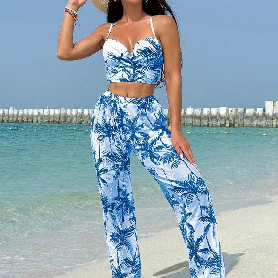 Women's bikini three-piece suit with printed pattern, available in black, blue, and emerald green colours