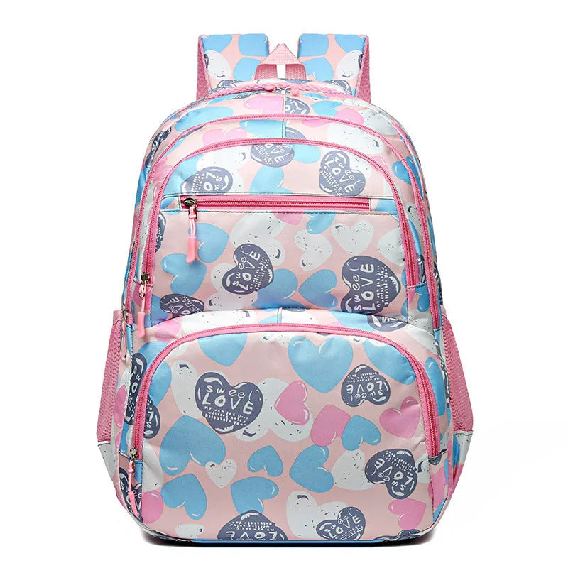 Blue student schoolbag with air pillow belt system for back burden alleviation