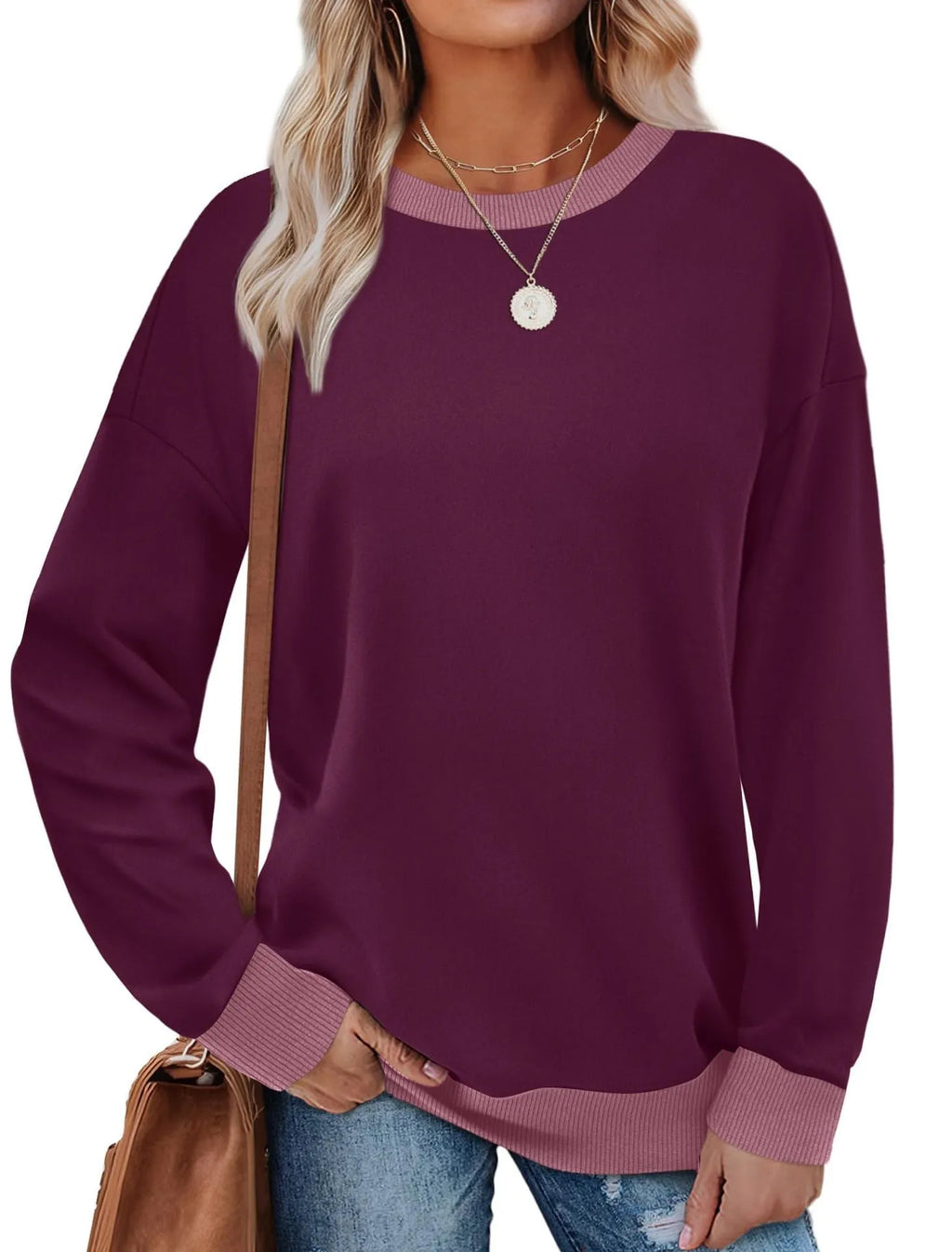Loose fit striped long sleeve top for women in apricot colour, showing round neck and long sleeves.