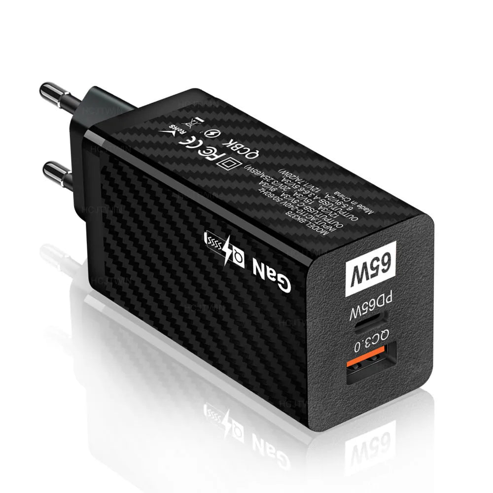 Gallium Nitride 65W universal laptop charger in black or white with UK, EU, and US plug options