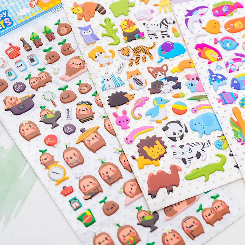 Cartoon 3D bubble stickers showing raised alpaca, dinosaur, cat and smiley face designs for hand account decoration
