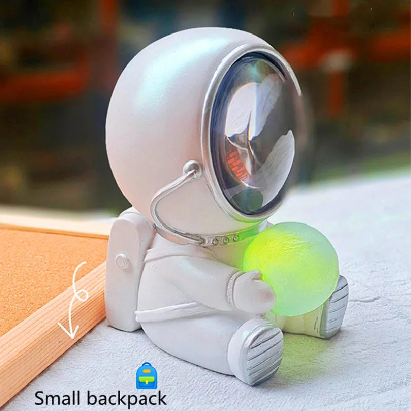 Animal-themed resin night light projecting starry sky lighting effect on surface
