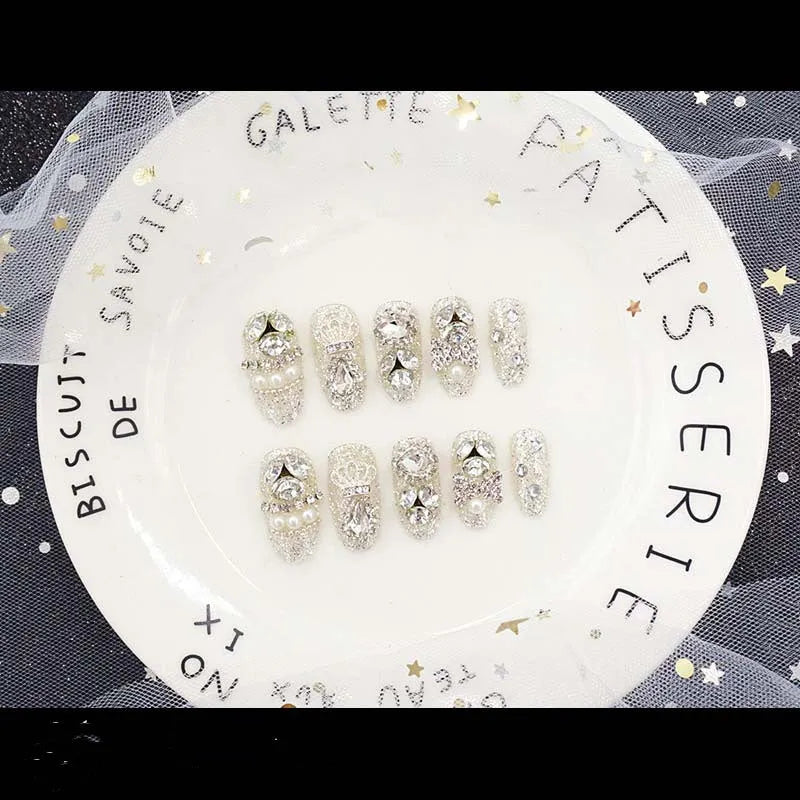Finished fake nails set of 24 with silver water drops pattern in wearing armour style