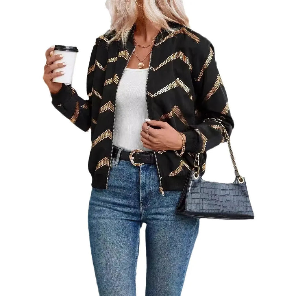 Women's black polyester spring jacket with gold zigzag print, conventional sleeves, shown on model
