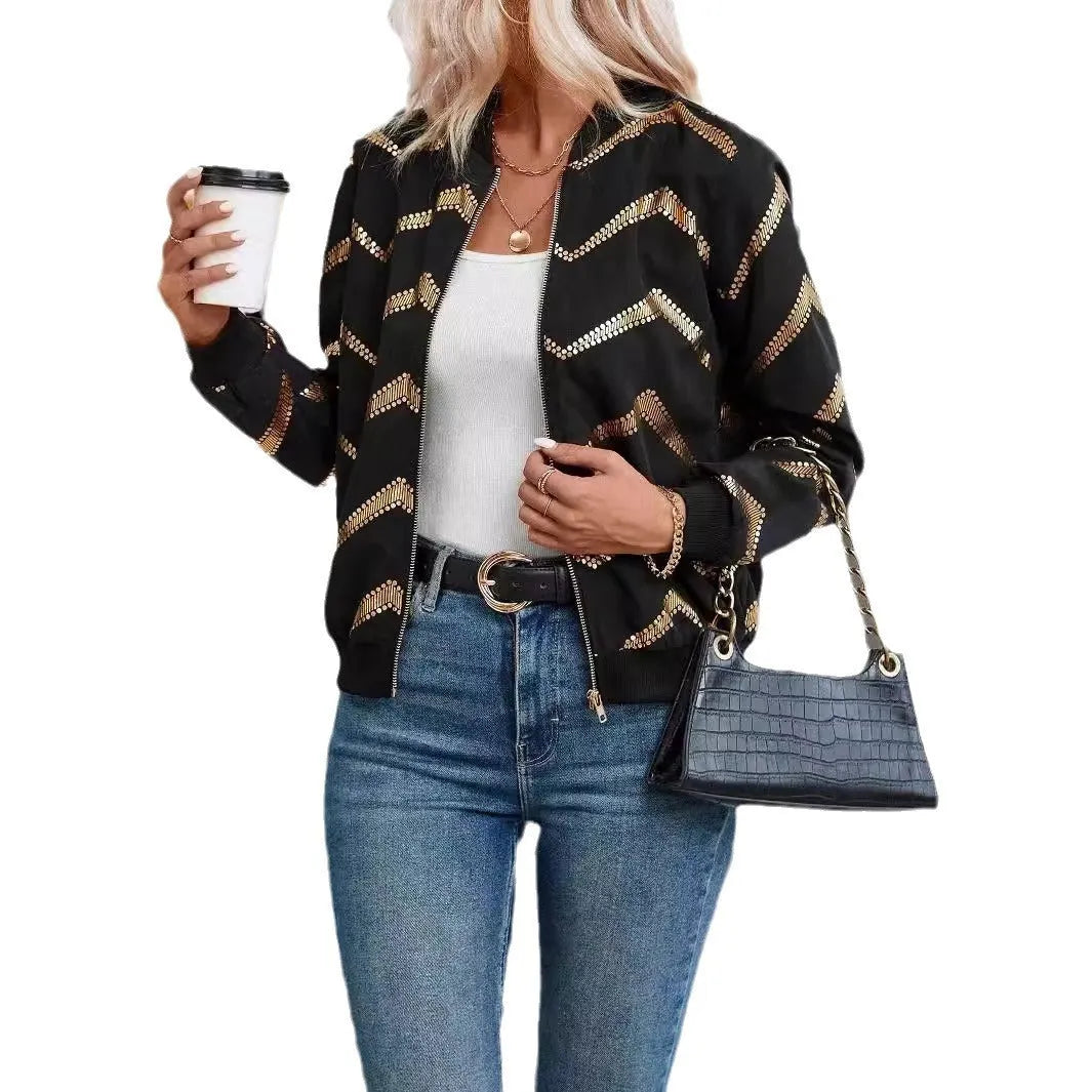 Women's black polyester spring jacket with gold zigzag print, conventional sleeves, shown on model