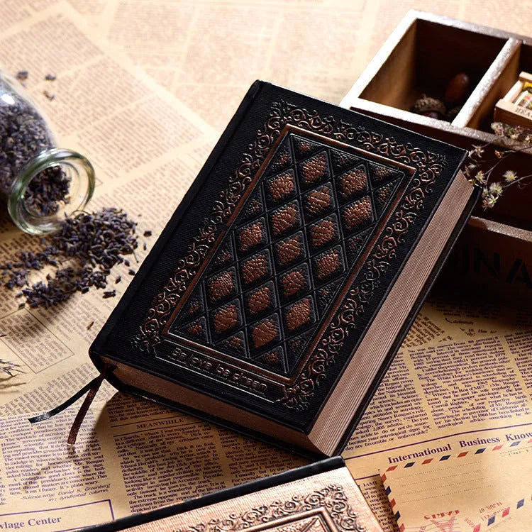 Embossed faux leather notebook with textured cover in bronze or black gold colour with thick writing pad