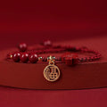 Cinnabar Ashore examination blessing bracelet with braided rope wristband and traditional ethnic styling