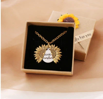 A stunning sunflower pendant necklace with an adjustable chain in various fashionable colors