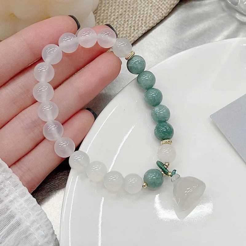 Women's retro Chinese style agate bracelet with carved lotus seedpod design