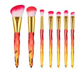 Ten clear crystal handle foundation brushes with artificial fibre bristles in four colours