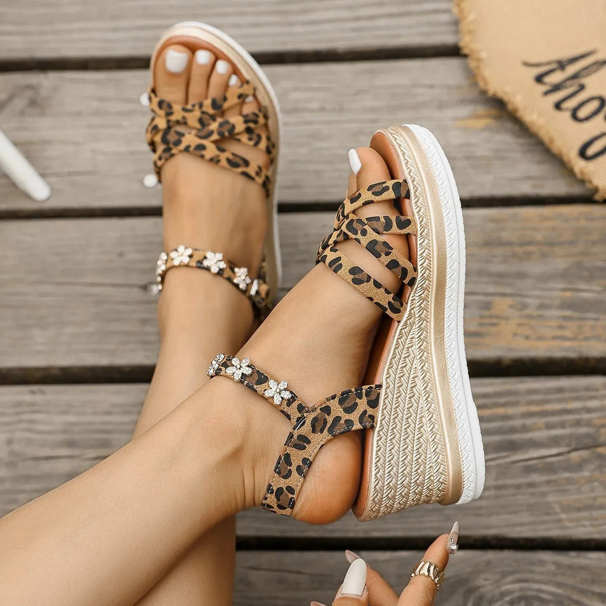 Light brown suede women's platform sandals with a buckle ankle strap.
