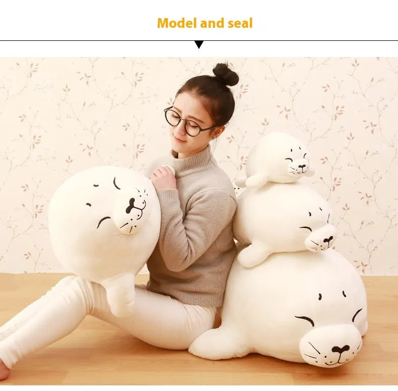 White sea lion plush toy with short plush fabric and PP cotton filling on display