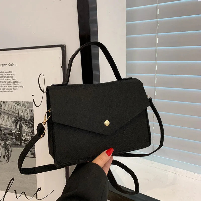 Women's non-woven shoulder messenger bag in white, compact size 22x15x8cm with long strap