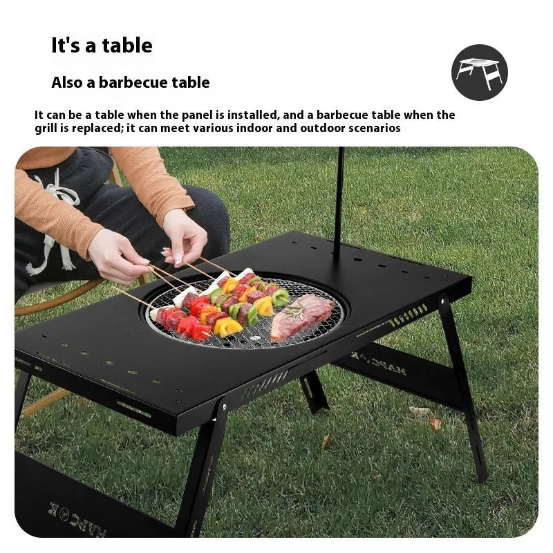 Black steel folding barbecue table with grill for outdoor cooking