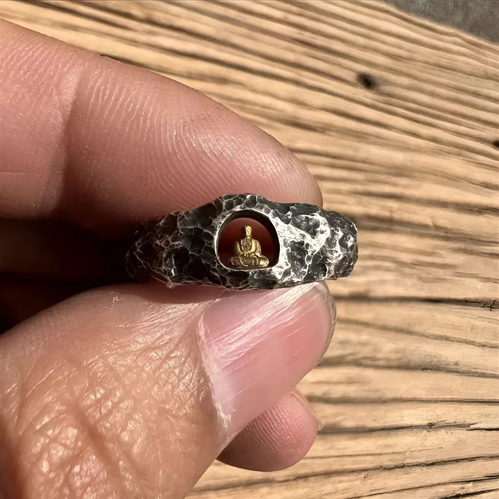 Hand-forged copper Grotto Buddha ring with a rock texture surface, shown in size 8.