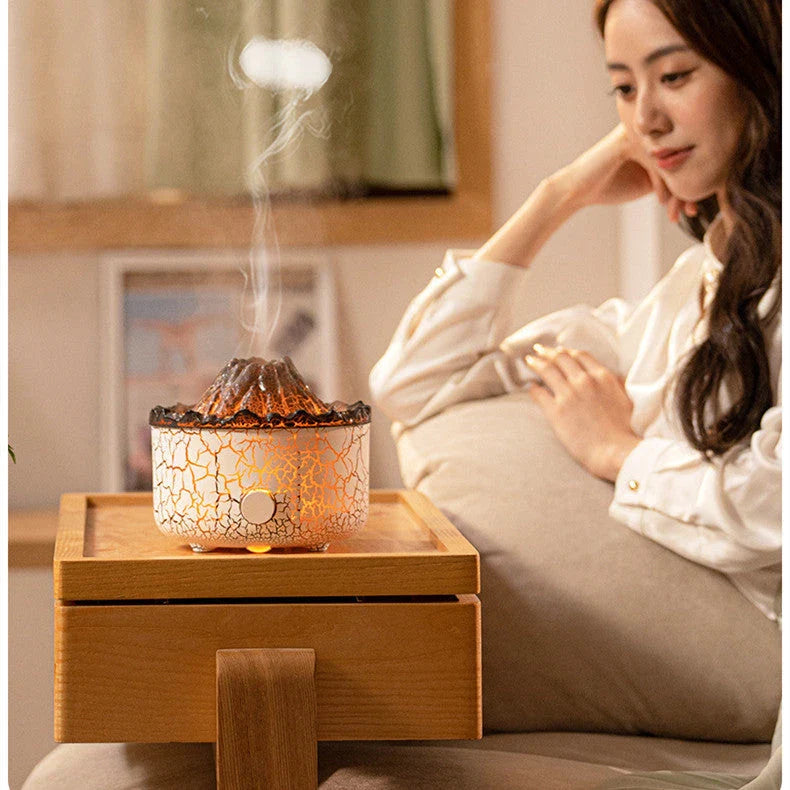 Stunning volcano-inspired humidifier with colorful LED lighting, creating a mesmerizing mist display for relaxing aromatherapy