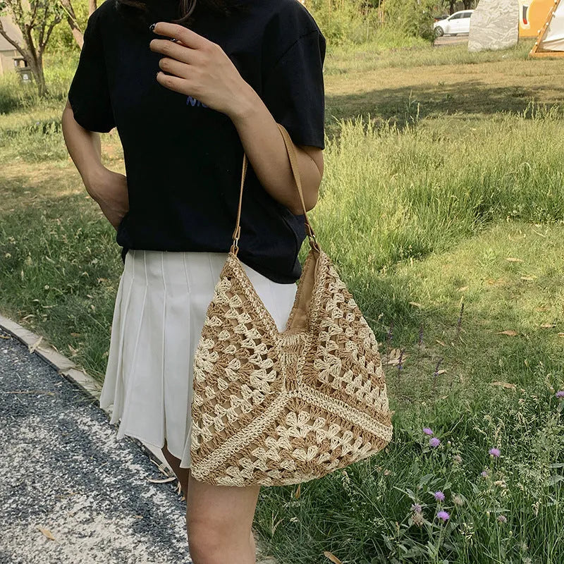 Handmade paper straw woven shoulder bag with hollow contrast colour weave and polyester lining in khaki beige or black khaki.