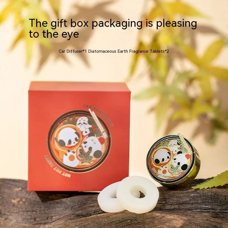 Panda-shaped car air freshener diffuser with changeable fragrance tablets for vehicle odour removal.