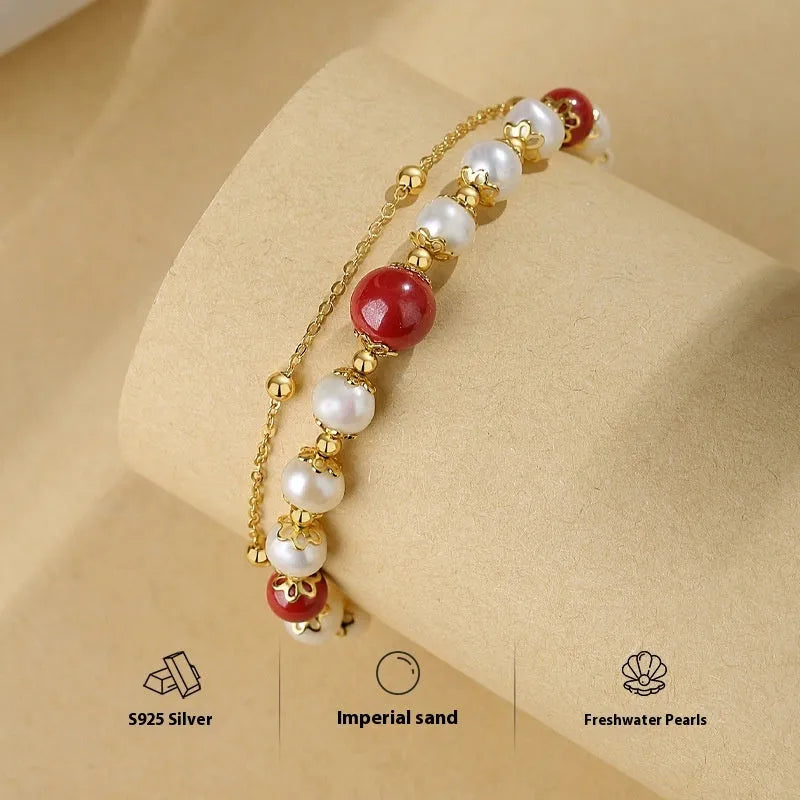 Sterling silver double-layer bracelet with freshwater pearls and cinnabar red bean charms