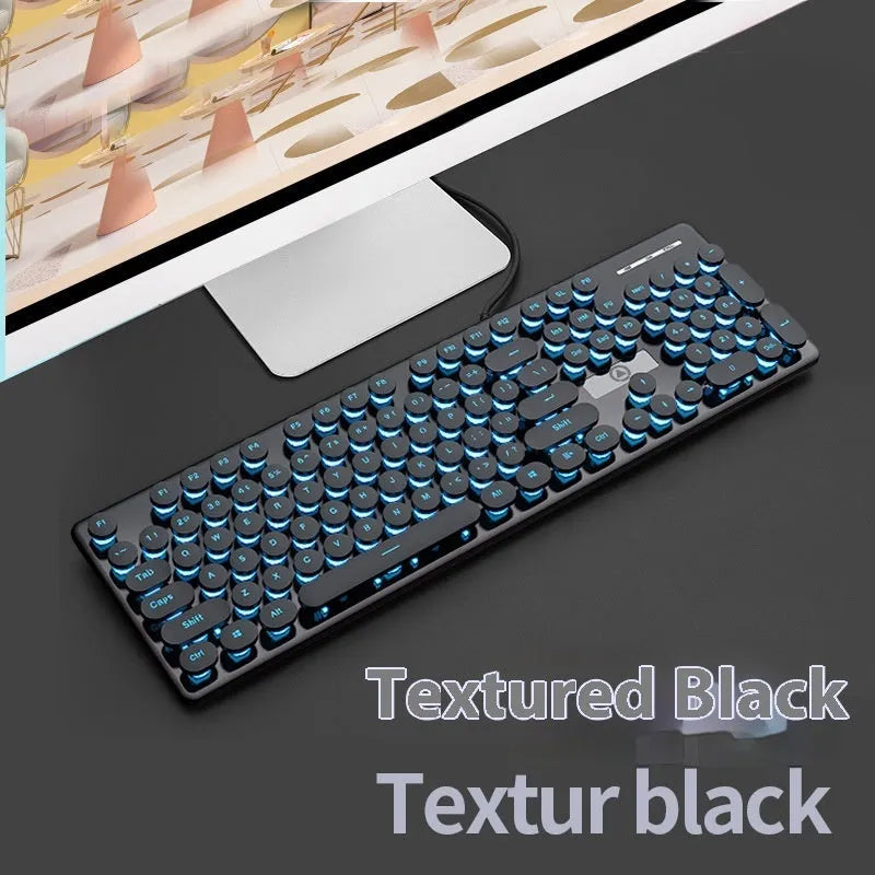 Punk style luminous keyboard in mint green with white backlit keys on a desk.